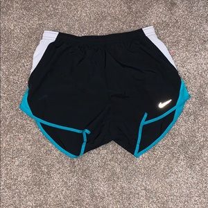 Black Nike running shorts